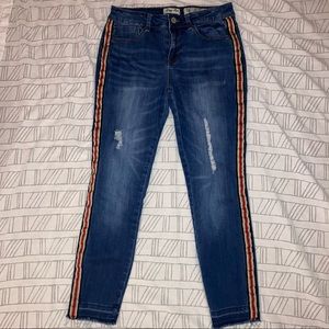 Skinny ripped jeans. Stripes outside of legs